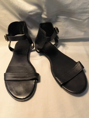 Correa de tobillo plana Cole Haan Signature Grand OS de cuero negro con punta abierta talla 11B Foto 1 de 4