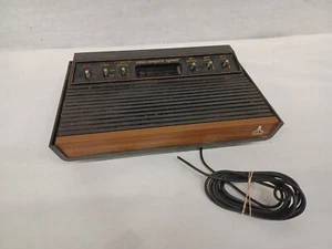 Atari 2600  Six Switch Woodgrain Console (not Tested) Broken Wire  - Picture 1 of 6