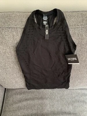 Camiseta sin mangas perforada sin costuras negra Victoria Secret Victoria Sport ES para mujer Foto 1 de 4