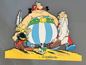 UDERZO - BELGIAN ENAMEL - ASTERIX OBELIX AND IDEFIX ON THE MARCH - SIGN - 1999 - Picture 1 of 6