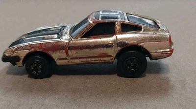 Vintage 1980 Kidco Burnin' Key Cars Datsun 280-ZX Dourado - Imagem 1 de 4