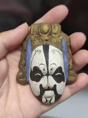 El "脸谱面具模型" de la cerámica del patrimonio cultural antiguo e inmaterial chino Foto 1 de 4