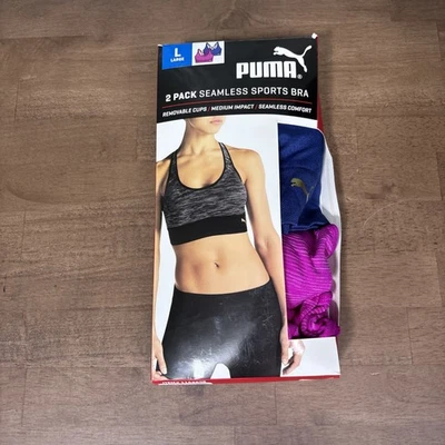 Pack de 2 sujetadores deportivos Puma sin costuras azul magenta grandes  Foto 1 de 4