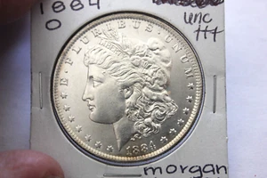 1884-O   STRONG BREAST FEATHERS    UNC+++   MORGAN SILVER DOLLAR  SPOT ON HOLDER - Picture 1 of 2