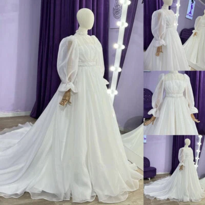 Vestidos de novia musulmanes de organza con tren de corte con cuentas cuello alto vestidos de novia Foto 1 de 4