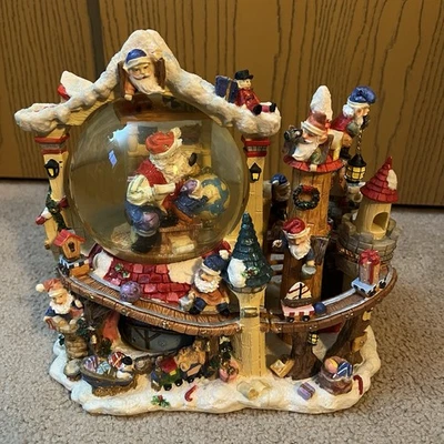 Grandeur Noel Musical Nieve Globo de Agua Navidad Santa Claus Taller Elfos del Polo Norte Foto 1 de 4