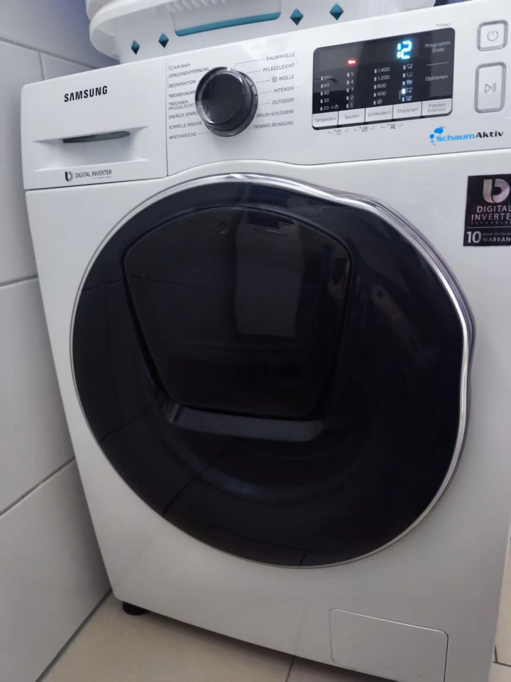 Samsung Waschtrockner WD5000T, 8/5 Kg, AirWash, SchaumAktiv - Bild 1 von 4