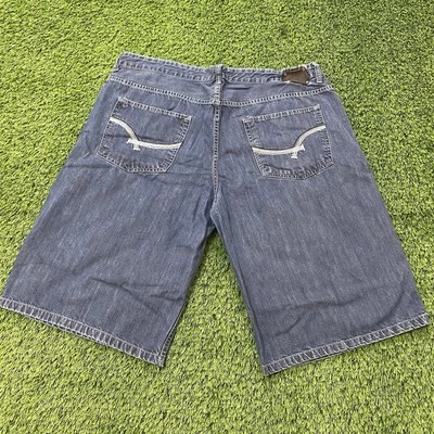 Pantalones Cortos de Jean Ecko Unltd Para Hombres Calce Suelto Azul Oscuro Diseño de Bolsillo Denim 42 Foto 1 de 4