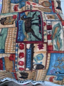 Fleece Fabric. Rocking Horse Collage. 28" x 60". - Picture 1 of 1