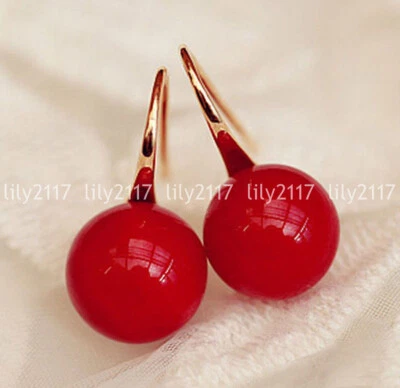 Pendientes colgantes de gancho de oro con cuentas redondas de perlas rojas del Mar del Sur de 8-12 mm Foto 1 de 3