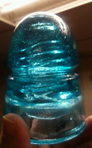 CD 145 American Insulator Co. insulator w/ V on dome, underpour, bubbles, etc.. - Picture 1 of 11