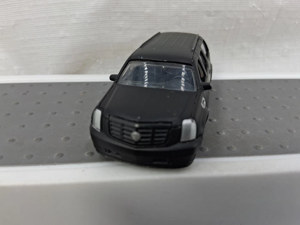 Jada 2007 Cadillac Escalade ESV Flat Black Die Cast 1:64 - Image 1 of 4