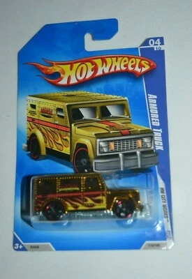 HOT WHEELS HW CITY WORKS 4/10 - CAMIÓN BLINDADO CROMO DORADO Foto 1 de 3