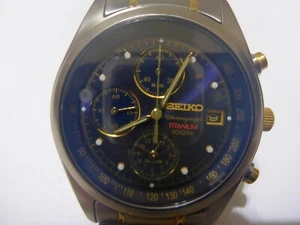 SEIKO TITANIUM QUARTZ ALARM CHRONOGRAPH SNA557P1⌚7T62 SPORTS 100 UNISEX WATCH✰ - Picture 1 of 13