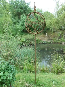 Ball on post rusty metal garden sculpture openwork orb 1.6 metres/64" H - Picture 1 of 3