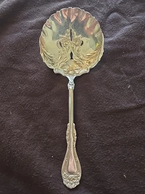 Antiguo Vintage Wm. Cuchara para servir tomate ranurada plateada A Rogers SXR  Foto 1 de 4