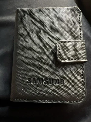 Funda tipo billetera Samsung de cuero con cierre magnético Foto 1 de 4