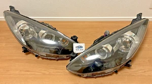Mazda Genuine Demio Mazda 2 07-13 HID Xenon Headlight Lamp Left Right Pair OEM - Picture 1 of 12