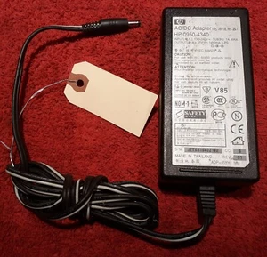 E42)   Genuine HP #0950-4340, AC-DC Power Adapter. Output: DC 31V, 1450mA. - Picture 1 of 2