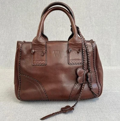 ANNA SUI hand bag with charm  genuine leather brown butterfly charm - Image 1 of 4