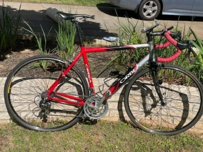Orbea 27 speed red and black used road bike with odometer and phone holder - Image 1 of 4