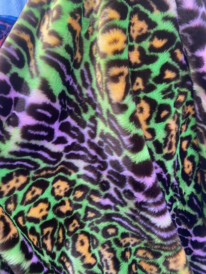 Purple /Green colored Leopard Spotted shaggy short pile faux fur fabric by  yard - Image 1 of 1