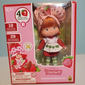 TLS Spielzeug Mini Erdbeere Shortcake 5,5" Puppe mit 4 Überraschungen zum Auspacken - Bild 1 von 7