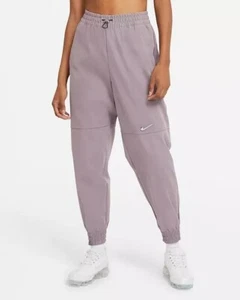 NEW Nike Sportswear Swoosh Women's Snug Comfort Woven Pants - Size M - Picture 1 of 3
