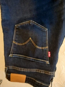 Levis Jeans dunkelblau, 725 High Rise Bootcut, noch gut erhalten W 30/ L 34 - Bild 1 von 4