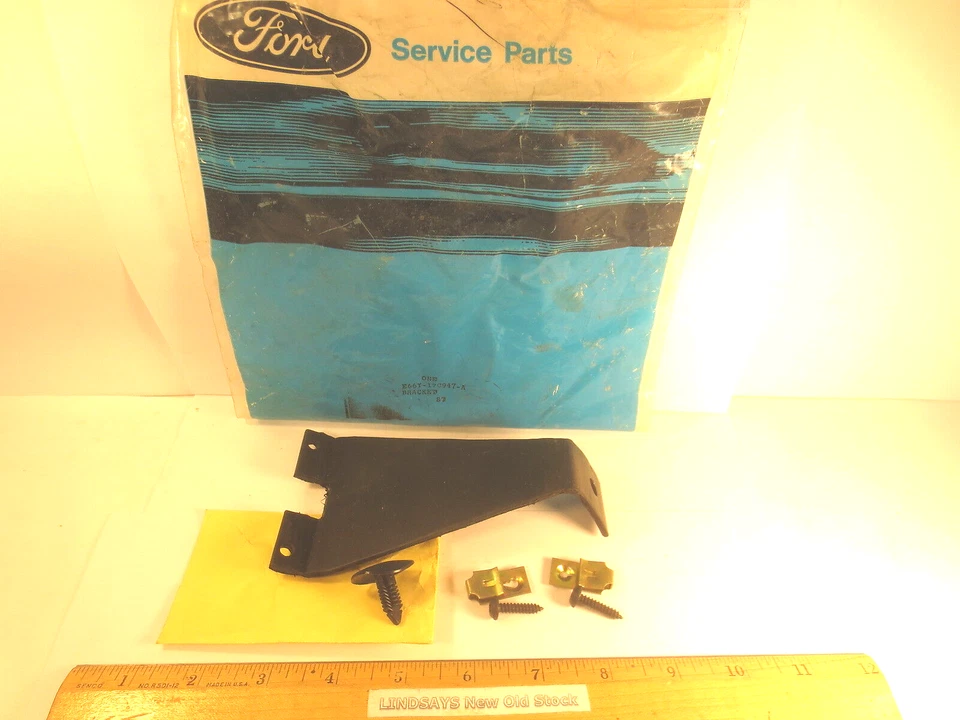 FORD 1986/1987 MERCURY TOPAZ "SOPORTE" (SOPORTE CUBIERTA PARACHOQUES DELANTERO) CENTRO NOS Foto 1 de 1