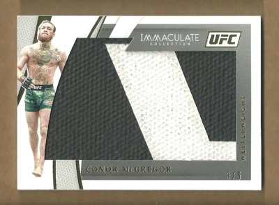 3/5 WOW Conor McGregor 2021 UFC Panini Immaculate Collection Swatch #FM-CMG - Image 1 of 2