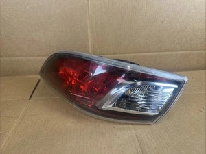 10 11 12 13 2010 2012 MAZDA 3 OUTER DRIVER LEFT TAIL LIGHT BRAKE LAMP LENS - Picture 1 of 5