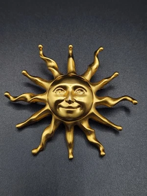 Prendedor/broche Anne Klein cara de sol celeste Foto 1 de 4