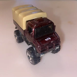 Vintage 1990 Hot Wheels Mercedes Umog Cargo Transport Truck Speckled Red Rare ++ - Picture 1 of 6