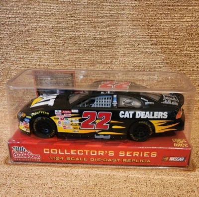Ward Burton 2002 #22 CAT Dealers Dodge 1/24 Racing Champions NASCAR Diecast - Image 1 of 4