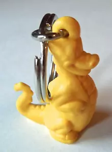 Schlüsselanhänger Tupperware gelber Dinosaurier Fun Flyer Schlüsselanhänger Douglass Dirtwalker Drache Neu - Bild 1 von 4