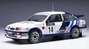 MODELLINO AUTO STATICO IXO FORD SIERRA #14 SAINZ 1000 LAGHI RALLY 1988 1/24 - Foto 1 di 5