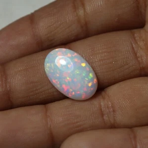 5.7 Carat 16.8x10.8 MM Natural Multi Fire Ethiopian White Opal Oval Cabochon - Picture 1 of 11