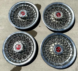 SET OF 4 VINTAGE PONTIAC WIRE SPOKE CHROME HUBCAPS - Picture 1 of 2