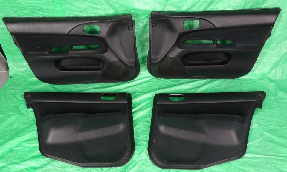 03-06 三菱 Lancer Evolution Evo 8 9 室内门板卡套装黑色 — 第 1/4 张图片