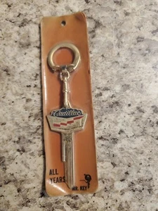 Llave en blanco vintage Mr Key chapada en oro Cadillac Crest 1935-1966 (B413) - Imagen 1 de 2