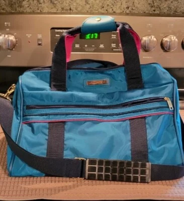 Vintage American Tourister Carry On Duffle Bag Weekender Teal Pink very nice - Image 1 of 4