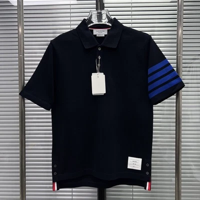 Camisa de manga corta Thom Browne clásica a rayas de algodón con cuello de solapa para hombre/mujer Foto 1 de 4