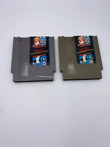 Lot of 2 Nintendo NES Vtg 1985 Mario Bros and Duck Hunt Cartridges For Parts - Picture 1 of 3