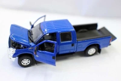 Camioneta Ford F-250 2016 azul escala 1/64 cabina diecast puertas abiertas Foto 1 de 4