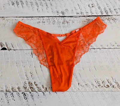 Tanga Victoria’s Secret Talla M Muy Sexy Naranja Soleado Rosa Ribete de Encaje Pierna Alta Foto 1 de 4