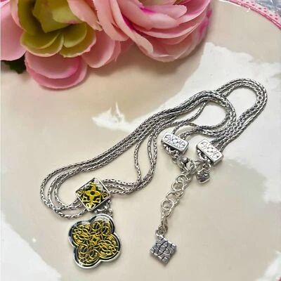 Collar Brighton Triple Cadena Plata Resina Negra y Dorada Foto 1 de 4