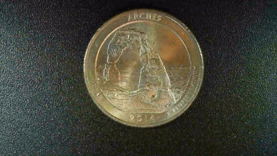 2014 P Utah Qtr w/ Die chip error on top of arches - Image 1 of 2