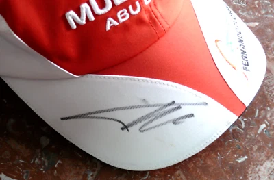 ATHENTIQUE SIGNATURE DE FERNANDO ALONSO SUR CASQUETTE FERRARI 2014 PARFAIT ETAT - Photo 1/4