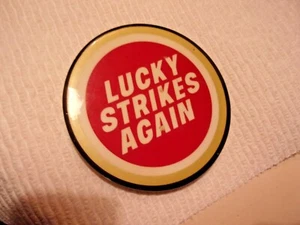 VINTAGE LUCKY STRIKES AGAIN PINBACK BUTTON N G SLATER NEW YORK CITY 2.5" DIAM - Picture 1 of 3